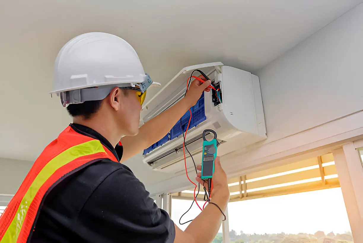 Home 9 Commercial Air Conditioning Contractor in Bonita Springs servicing rooftop HVAC unit